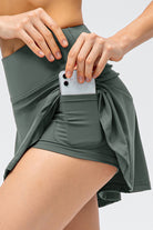 Elevate your workout game with our Active Skirt Skort! Built in short with a pocket for cell phone, money, keys, credit cards, notepad or paper. Designed for both comfort and style, this versatile piece features a lightweight fabric and built-in shorts to keep you moving freely. Don't just feel confident during your workouts, look good while doing it!