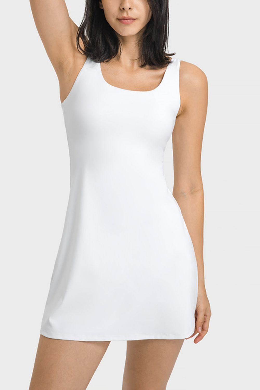 Unlock peak performance and style with the Millennia Square Neck Sports Tank Dress! Equipped with discrete pocket bottoms, it's perfect for your athletic endeavors and everyday comfort. Whether at the gym or on the move, feel confident and fashionable. Don't wait, get yours now and elevate your athletic wardrobe!