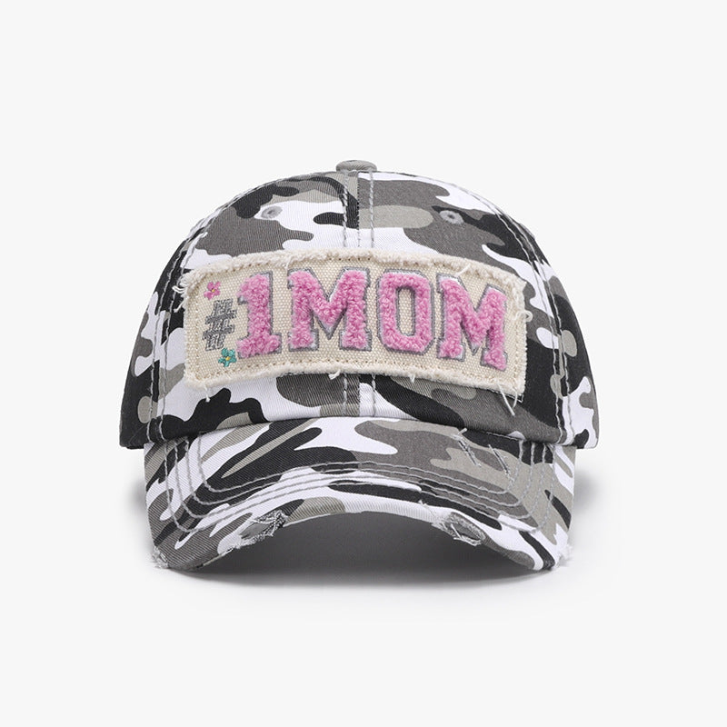 Show off your #1 Mom status with our Adjustable Cotton Baseball Cap! Made with high-quality cotton, this cap offers ultimate comfort and can be easily adjusted for the perfect fit. Available in a variety of colors, it's perfect for running errands or family outings. Wear it with pride, mom.