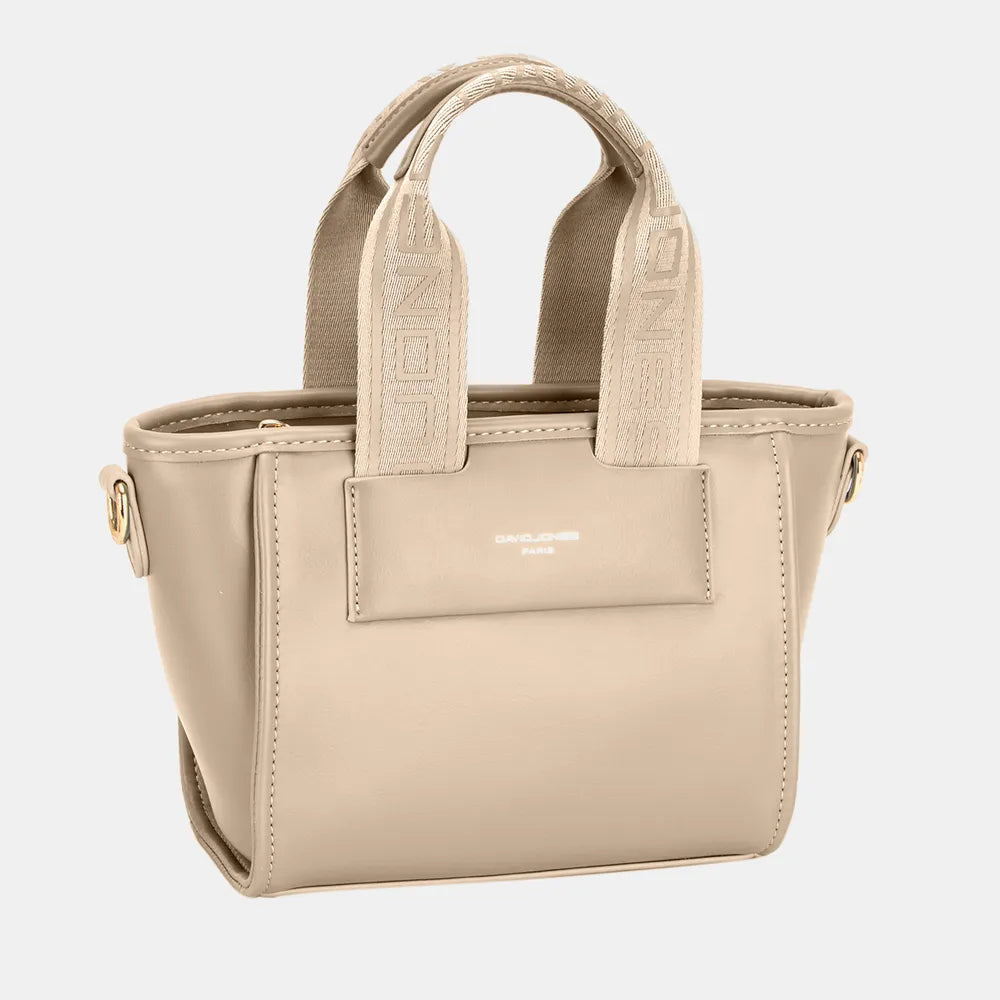 The Small Handbag with Embossed Pattern Handles features a compact, structured design with embossed handles for a refined look. It holds your essentials comfortably and can be carried by hand or with a detachable strap, making it suitable for any occasion.
