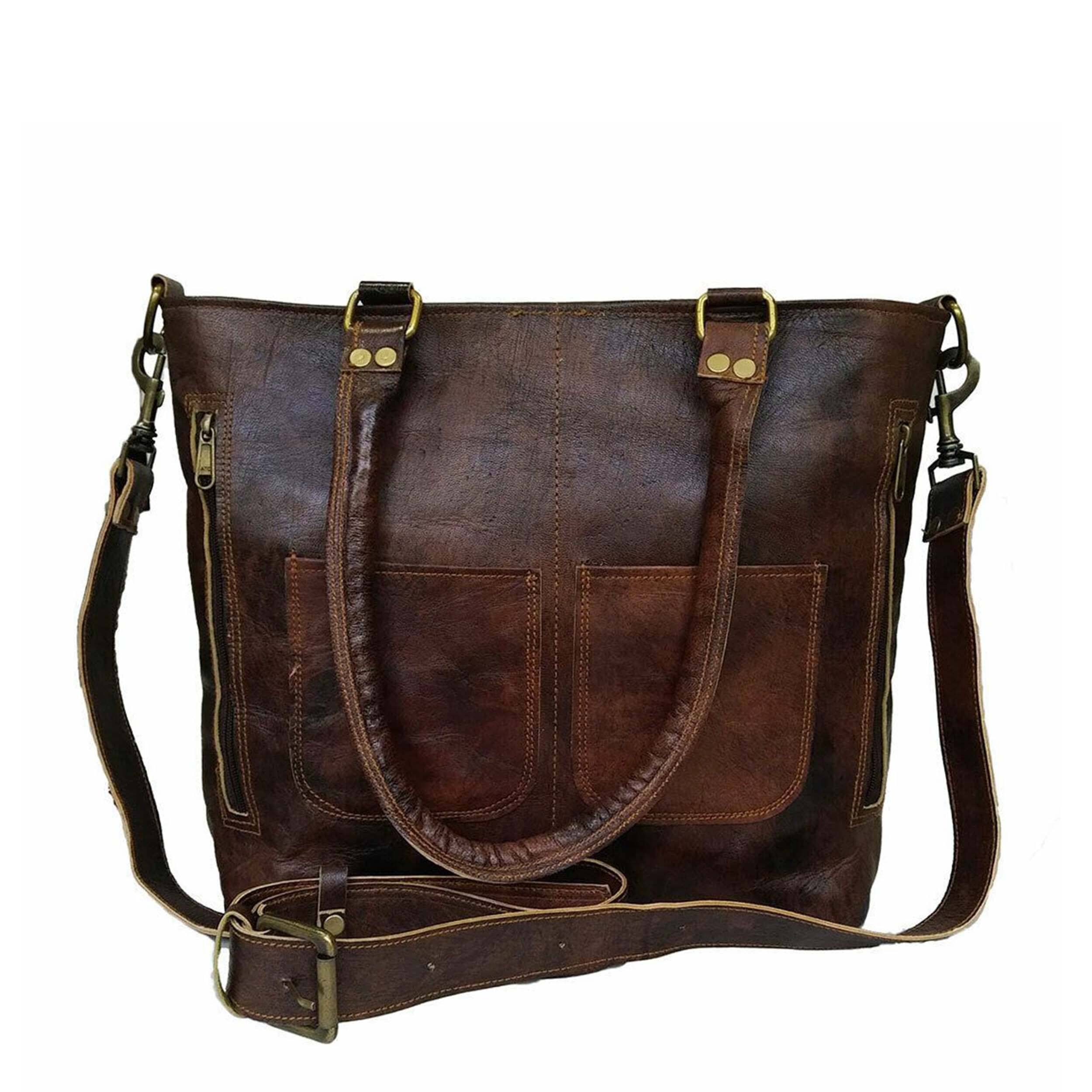 Brown leather bag with shoulder strap on a white background