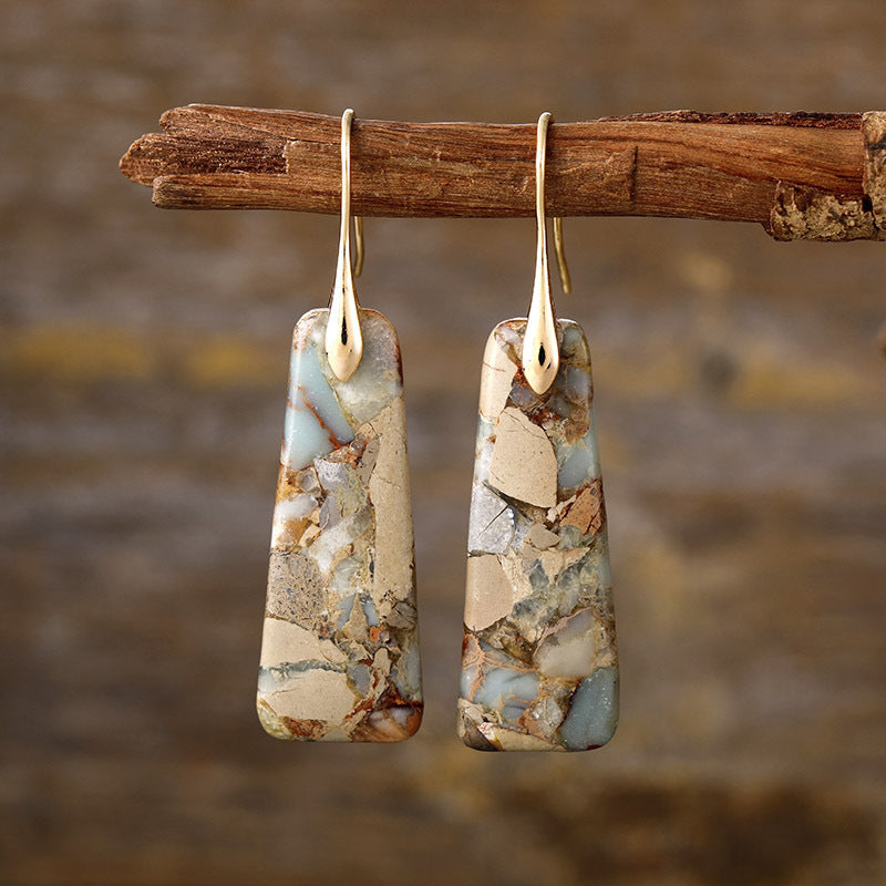 Experience the beauty of nature with our handcrafted Copper Natural Stone Earrings. Made with high-quality copper and natural stones, these Cruisin Essentials earrings add a touch of elegance to any outfit. Feel confident and stylish with these unique and eye-catching accessories!