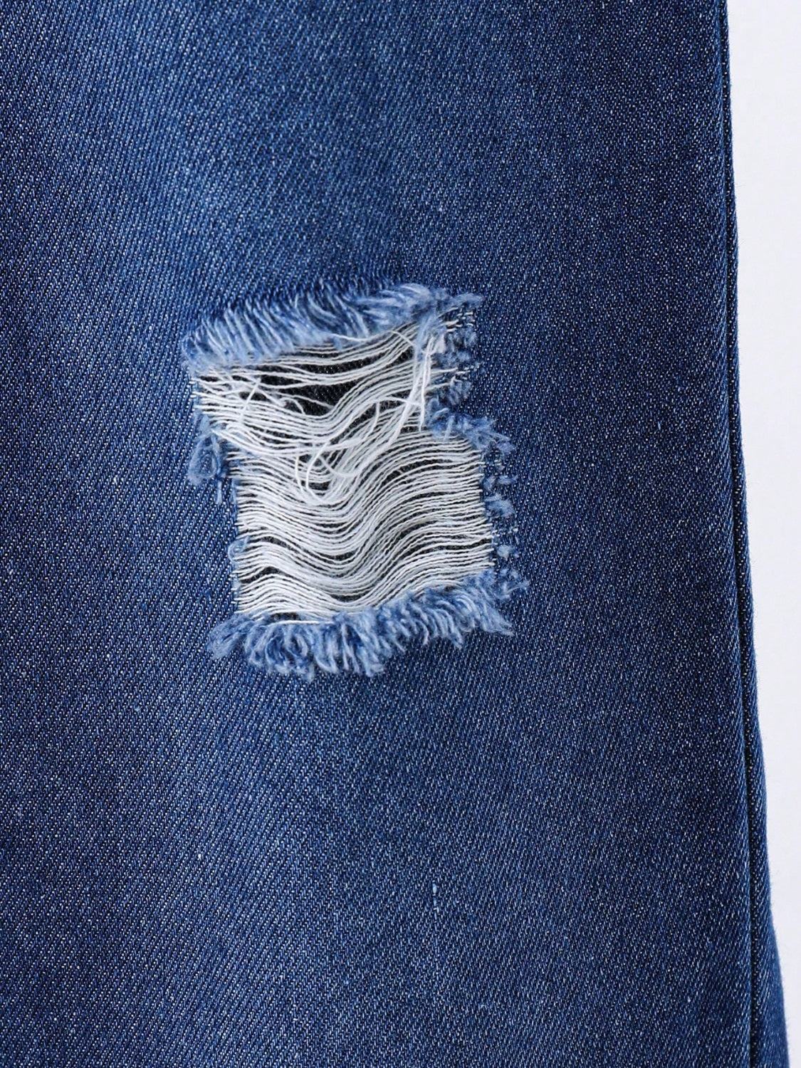 Give your child a stylish and comfortable outfit with our Children's Round Neck Letter Graphic T-Shirt and Distressed Jeans Set. Made with soft fabrics and trendy distressed detailing, it's perfect for kids on the go. The bold letter graphic adds a fun touch, making this set a perfect combination of fashion and function.