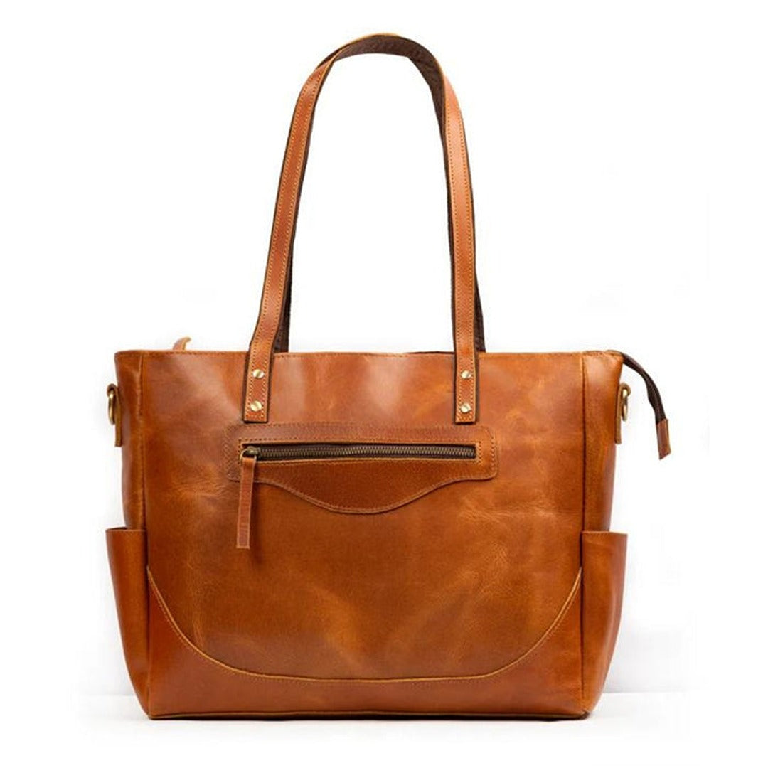 Brown leather tote bag on a white background