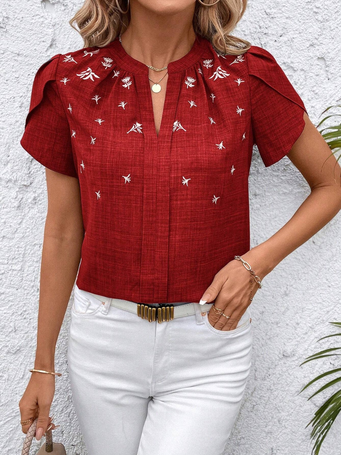 Enhance your collection with this expertly designed Floral Notched Short Sleeve Blouse. It showcases a sleek notched neckline paired with a subtle floral print, delivering a polished and refreshing appearance. Made with breathable materials for comfort and extended wear, it suits both office environments and casual settings. This blouse perfectly balances style and functionality, making it a versatile piece for any wardrobe.
