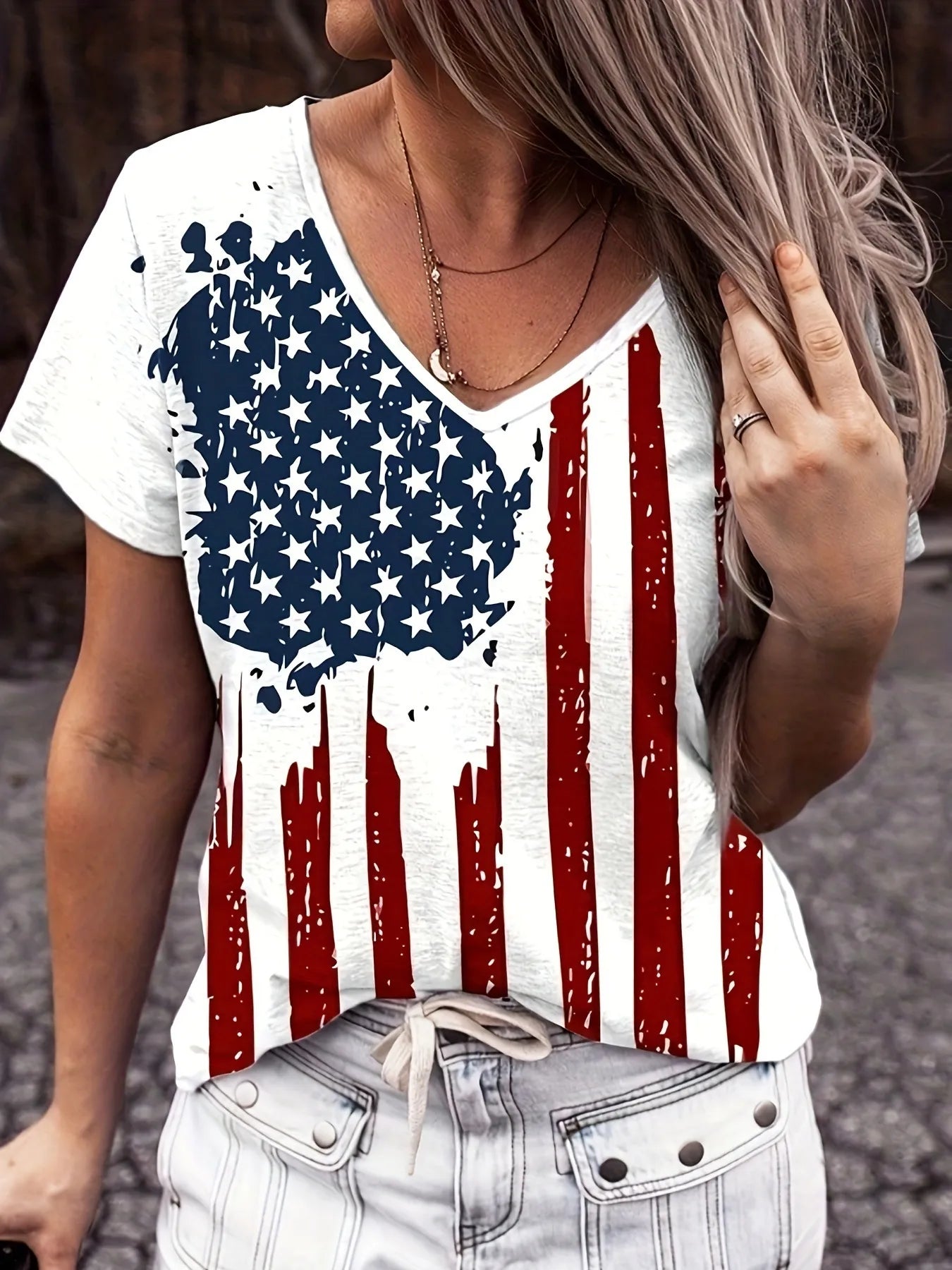 The American Flag V-Neck Short Sleeve T-Shirt blends classic patriotism with contemporary style. Made from high-quality, breathable fabric, it ensures lasting comfort and a refined fit. The V-neck design enhances versatility, making it suitable for layering or standalone wear. Featuring a vivid American flag print, this tee allows you to express national pride confidently, whether at casual events or commemorative occasions. Durable and stylish, it’s a reliable addition to any wardrobe.