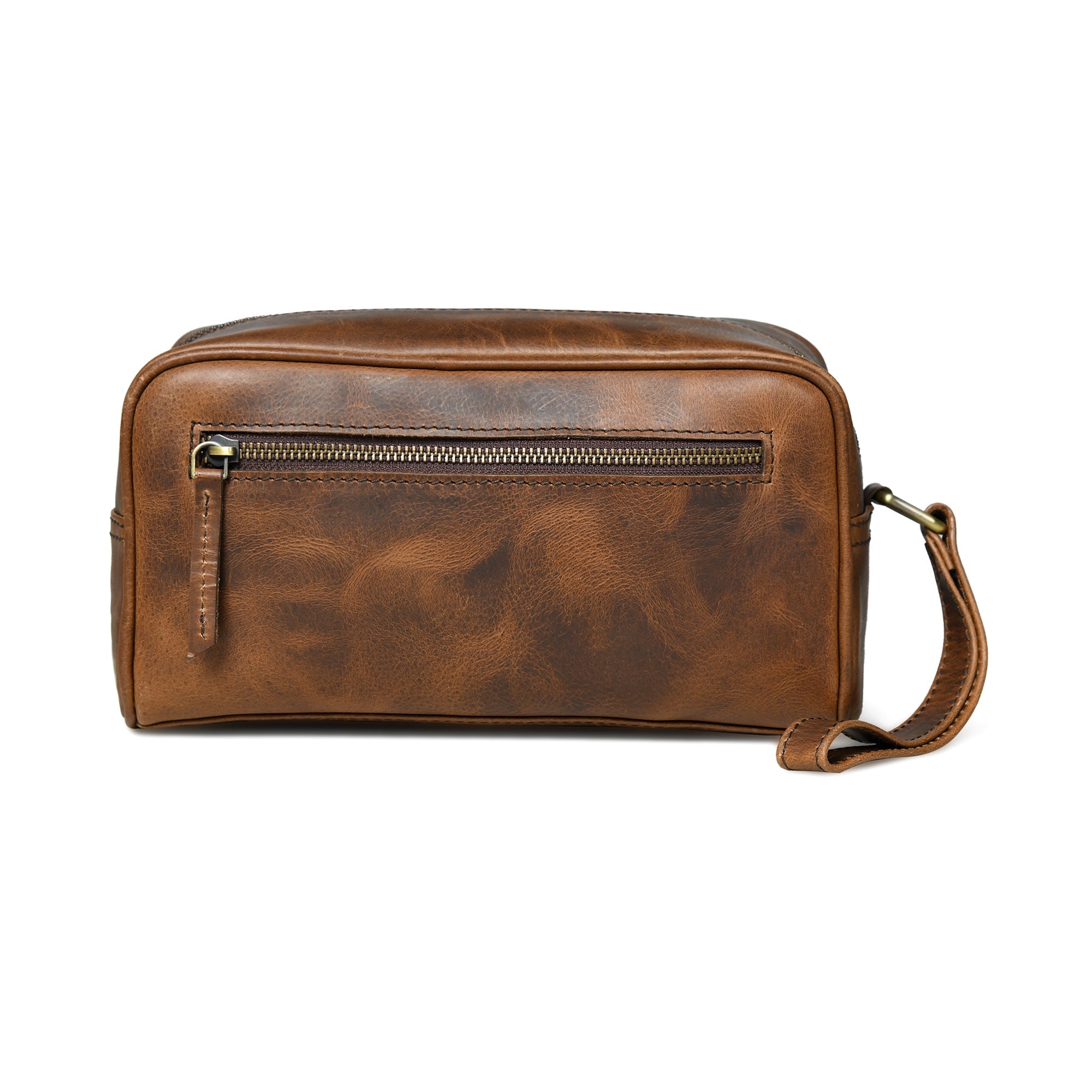Brown leather toiletry bag, buffalo leather with a strap on a white background