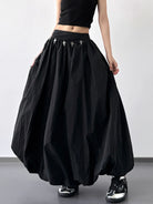 The Elastic Waistband Bubble Maxi Skirt by Cruisin Essentials combines comfort and style with its stretchy fit and flattering bubble shape. Versatile for any event, it’s an easy addition to your wardrobe.