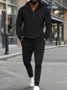 Elevate your activewear with our Men's Full Size Waffle-Knit Half Zipper Hoodie and Pants Set! Made for jogging, gym, or everyday wear, this set is designed with comfort and style in mind. Available in a range of plus sizes and neutral colors to suit any man's wardrobe.
