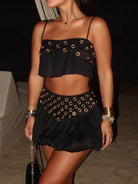 Command attention with the Eyelet Cami and Bubble Skirt Set. Featuring a bold eyelet cami that reveals just enough and a voluminous bubble skirt that adds a playful yet fearless flair, this set is designed for those who dare to break the mold. Perfect for nights out or standout summer days, it balances edgy style with confident comfort to ensure you own every moment.