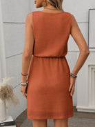 Introducing the Tank Dress - the perfect summer must-have! Made from comfortable, waffle-knit fabric, this sleeveless mini dress features a drawstring waist for a flattering fit. Stay cool and stylish all season long with the Tank Dress!