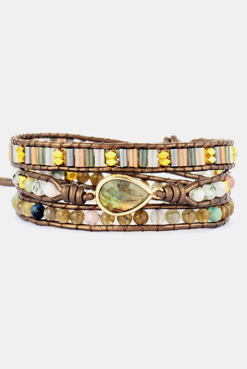 Multistrand beaded bracelet with a central gold teardrop bead on a white background