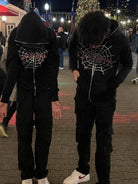 Step up your style with the Men’s Spider Web Rhinestones Zip-Up Hoodie. Featuring a unique spider web design accented with dazzling rhinestones, this hoodie blends edgy fashion with comfortable wear. Its zip-up style offers easy layering, making it perfect for cooler days while helping you stand out with confidence and flair.