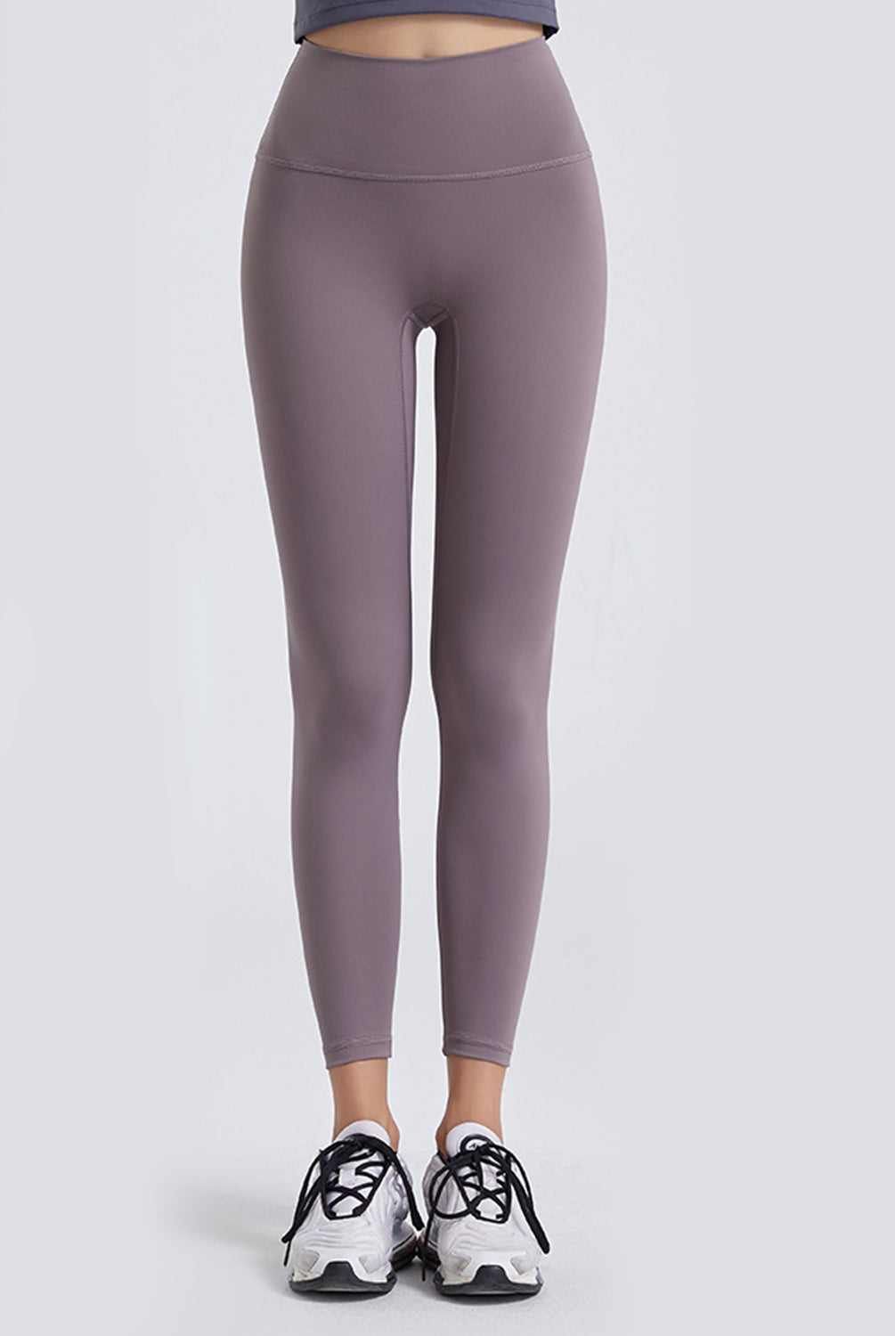 Get ready to take your workout to the next level with our Wide Waistband Sports Leggings for women! It's time to upgrade your active wear collection with these leggings that offer the perfect combination of comfort and style. The wide waistband provides the support you need for any movement, while the high-quality material guarantees durability for long-lasting wear. Don't sacrifice comfort for look, these leggings have got you covered. So why wait? Grab a pair and feel confident and comfortable during your