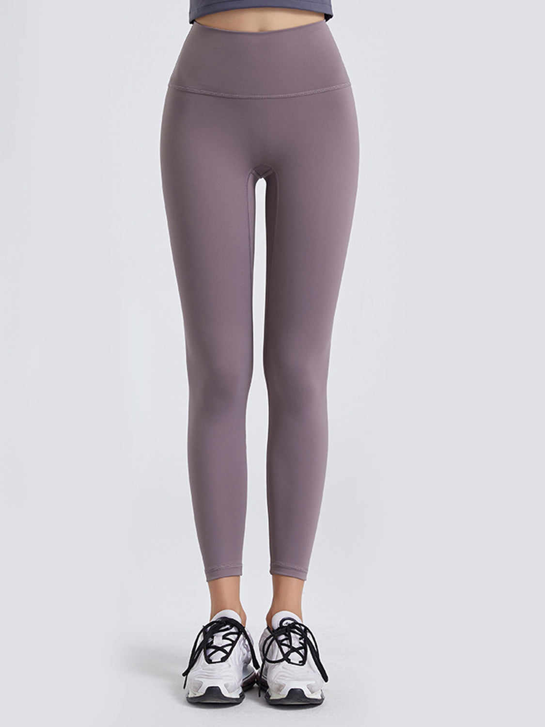 Get ready to take your workout to the next level with our Wide Waistband Sports Leggings for women! It's time to upgrade your active wear collection with these leggings that offer the perfect combination of comfort and style. The wide waistband provides the support you need for any movement, while the high-quality material guarantees durability for long-lasting wear. Don't sacrifice comfort for look, these leggings have got you covered. So why wait? Grab a pair and feel confident and comfortable during your