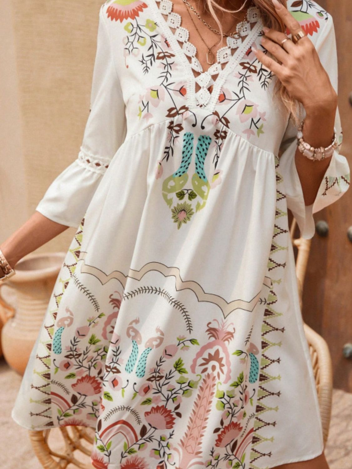 Experience luxury and elegance with our Three-Quarter Sleeve Lace Detail Printed Dress. The intricate lace and delicate print create a striking blend, while the sleeves add a sophisticated touch. Elevate your wardrobe with this essential dress for any event.