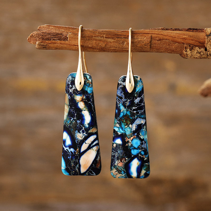Experience the beauty of nature with our handcrafted Copper Natural Stone Earrings. Made with high-quality copper and natural stones of marble blue, black, purple and creamy ivory. These earrings add a touch of elegance to any outfit. Feel confident and stylish with these unique and eye-catching accessories!