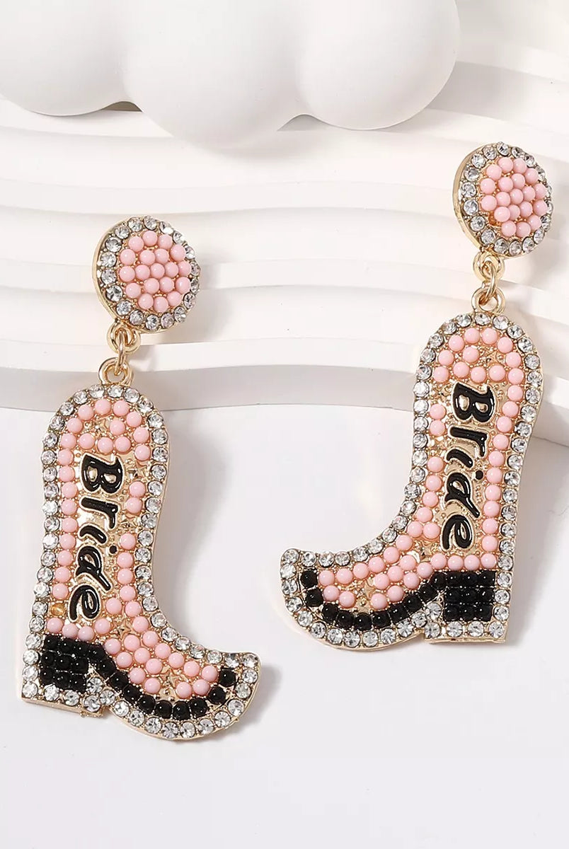 Cowboy boot earrings with 'Bride' text on a white background