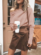 Capture attention in this Full Size One-Shoulder Ribbed Sweater that highlights your curves beautifully. The soft ribbed material fits snugly, while the stylish one-shoulder design adds a cheeky pop to your outfit. Great for layering or wearing by itself, this plus-size sweater infuses your wardrobe with a playful and comfortable vibe.