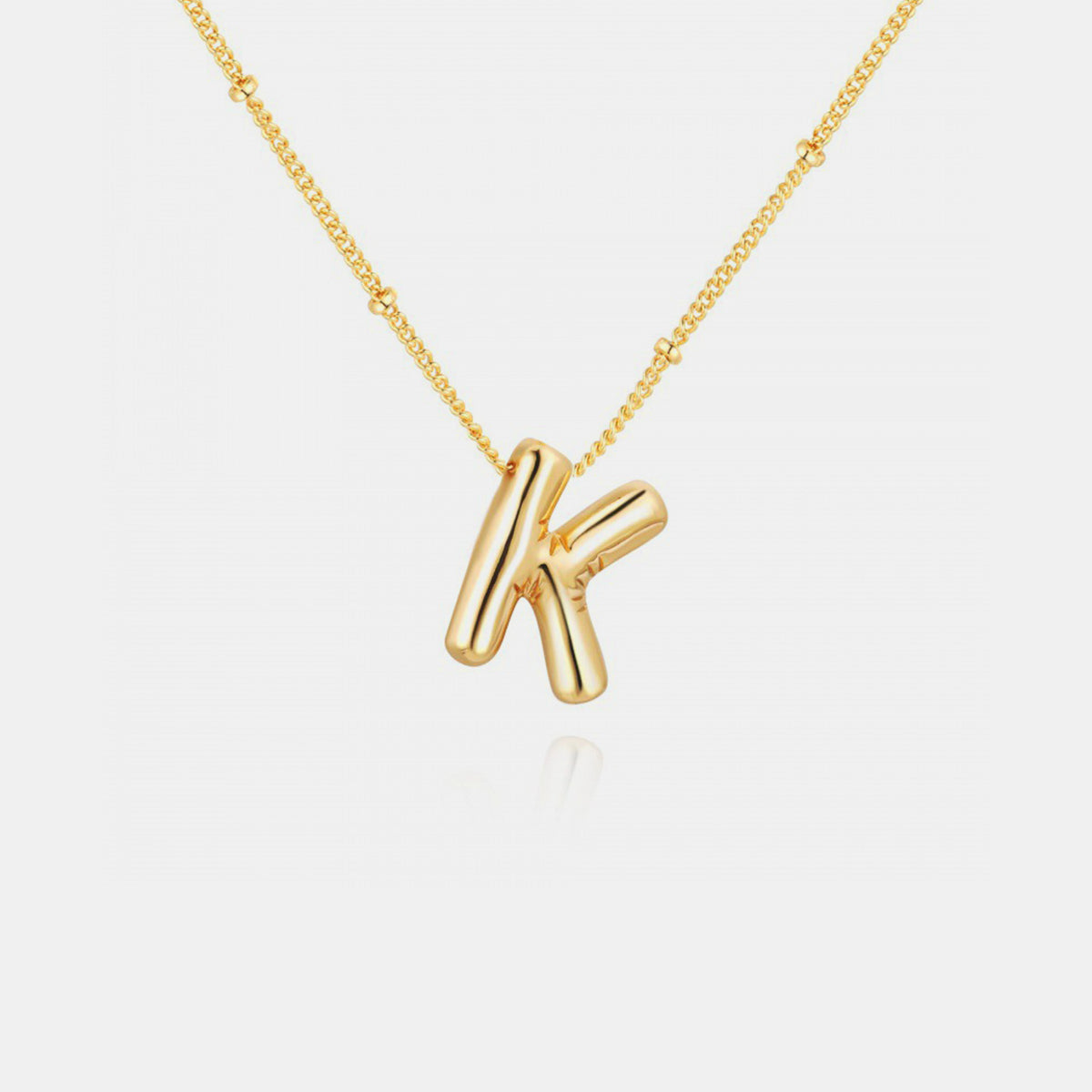 Add a personal touch to your look with this gold-plated letter pendant necklace. Its elegant bubble letter design offers a stylish and timeless accessory perfect for everyday wear or gifting. Loved by Oprah in 2025, it’s a simple way to elevate any outfit.