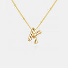 Add a personal touch to your look with this gold-plated letter pendant necklace. Its elegant bubble letter design offers a stylish and timeless accessory perfect for everyday wear or gifting. Loved by Oprah in 2025, it’s a simple way to elevate any outfit.