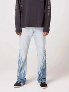 Elevate your style with our Men's Flame Pattern Patch Cargo Jeans. These premium jeans feature a unique flame pattern that adds an exclusive touch. With cargo pockets for added convenience, these jeans are perfect for the trendy, sophisticated man.