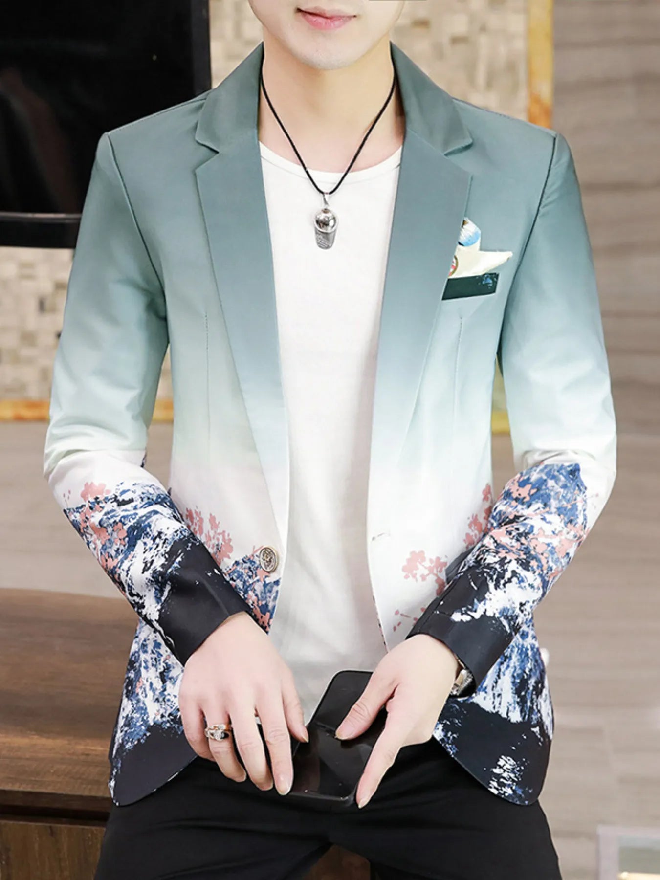 This plus size men's blazer features a single button, long sleeves, and a colorful iridescent print. Designed for comfort and style, it offers a flattering fit that stands out for any occasion.