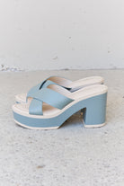 These Misty Blue platform sandals offer both style and comfort. Adjustable crisscross straps provide a secure fit, while the contrasting colors give a fresh, modern look. The platform sole adds height and stability, making them great for all-day wear. Perfect for upgrading your summer style.