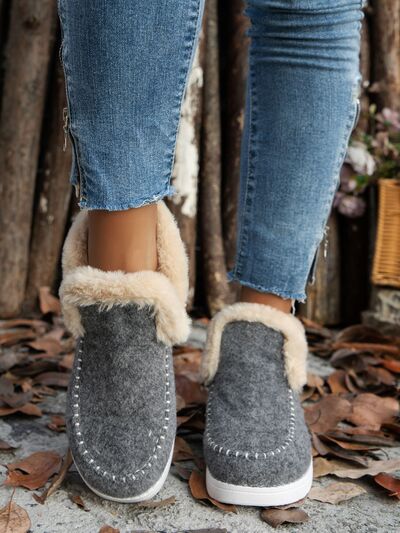 Get cozy and stylish with our Furry Suede Round Toe Flat Sneakers. The soft and furry exterior offers comfort and warmth, making them perfect for any occasion. Elevate your look and make a statement with these sneakers.