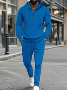 Get ready to elevate your activewear game with our Men's Full Size Waffle-Knit Half Zipper Hoodie and creased Pant Set! Available in white, blue, black, gray, and beige, this set is perfect for jogging, hitting the gym, or just hanging around. The waffle-knit material provides both comfort and style, making this set a must-have for any active man. Available in sizes S-3XL for the perfect fit.
