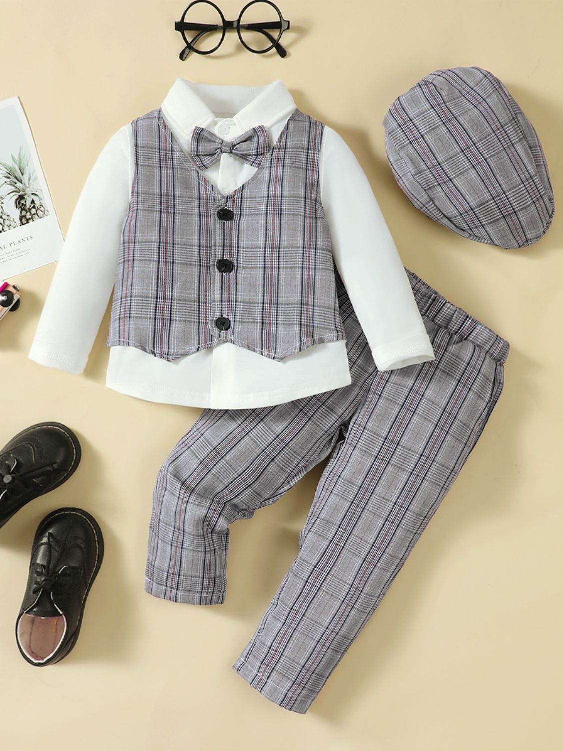 This 4-piece set includes a cozy hat, long sleeve shirt, plaid vest, and pants to complete your little one's wardrobe! With a stylish and versatile design, this set is perfect for any occasion and will keep them warm and fashionable all day long. Turn heads and create endless stylish outfits with this must-have set!