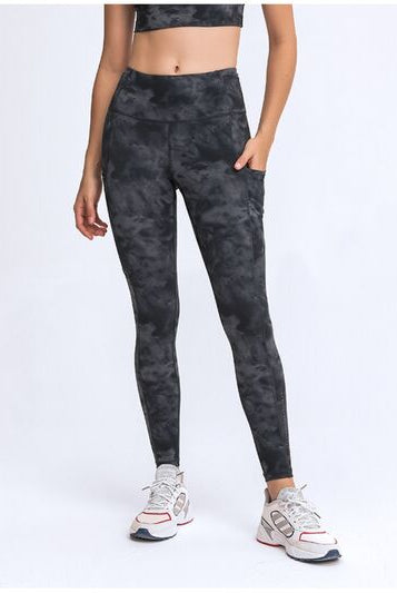 Crafted by industry experts, these Double Take Wide Waistband Leggings with Pockets by Trendsi Trends are ideal for the style-conscious individual.