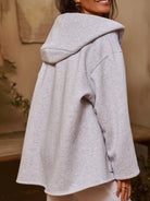 This oversized hoodie has dropped shoulders and pockets. Made from 95% polyester and 5% spandex, it offers slight stretch for comfort.