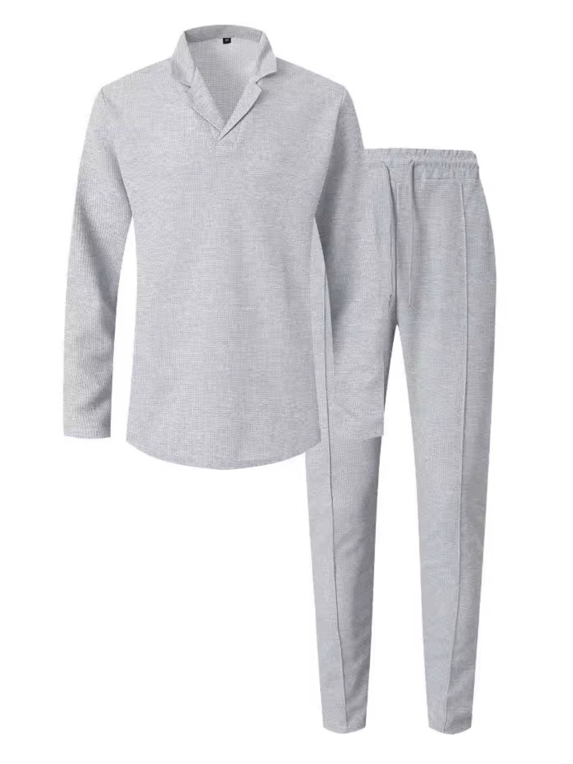 Elevate your loungewear with our Men's Waffle-Knit Long Sleeve Top and Pants Set. Available in a variety of classic colors and sizes, this set combines comfort and style for any occasion. Stay cozy and stylish all year round with our high-quality waffle-knit fabric.
