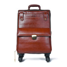 Brown leather suitcase with wheels on a white background