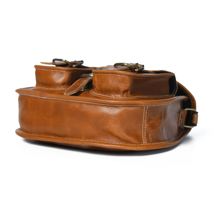 Brown leather bag on a white background