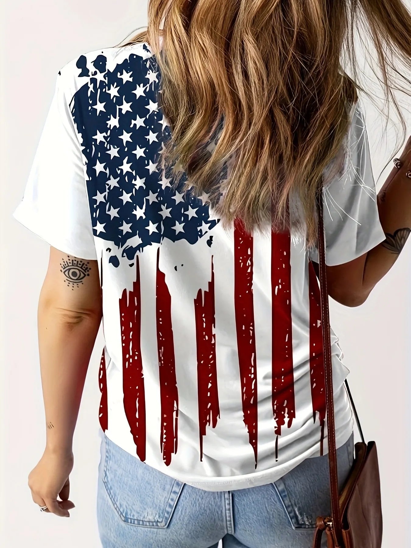 The American Flag V-Neck Short Sleeve T-Shirt offers a premium blend of comfort and patriotic style. Crafted from soft, breathable materials, it ensures a comfortable fit throughout the day. The V-neck cut provides a modern, flattering silhouette, while the detailed American flag design delivers a bold statement of national pride. Ideal for casual wear, holidays, or community events, this t-shirt combines durability with a refined look for confident, everyday patriotism.

