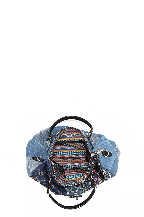 The "Bosque de Amor" Denim Boston Bag brings a mystical, boho vibe to your style, ideal for bold, free-spirited individuals. Zippered with pockets and key ring