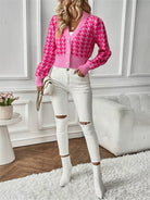 This Houndstooth V-Neck Button Up Cardigan combines a classic pattern with a tailored fit. Its V-neck design layers easily over shirts or tees, and the button-up front offers adjustable comfort. Durable and versatile, it suits both professional and casual occasions.
