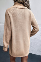 Bakc of beige turtleneck sweater dress with pockets.