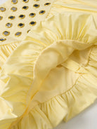 Turn heads effortlessly with the Eyelet Cami and Bubble Skirt Set. This daring ensemble features a delicately detailed eyelet cami that reveals just enough to intrigue, paired with a voluminous bubble skirt that adds bold shape and movement. Designed for those who embrace fearless fashion, this set blends playful charm with confident edge to make every outing unforgettable.