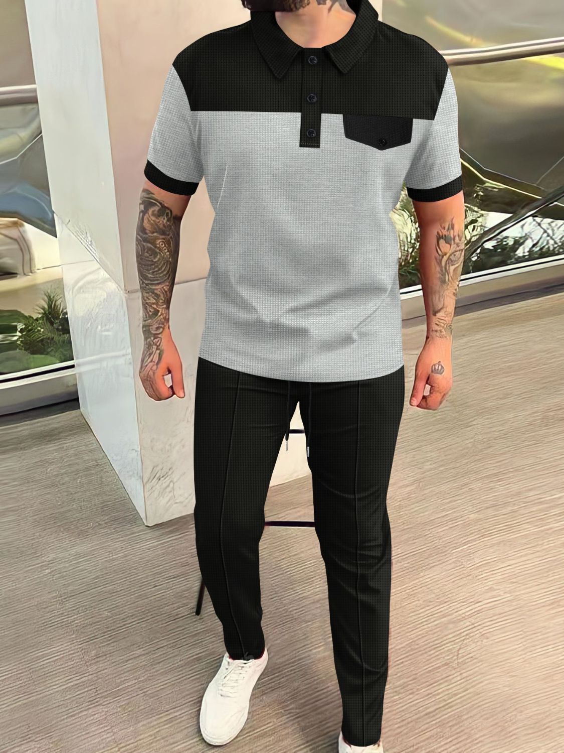 Elevate your casual wardrobe with our Men's Waffle-Knit Contrast Top and Pants Set! Crafted from high-quality materials, this set features a stylish green and black polo top with a convenient pocket, paired with versatile pants in a rich color palette. Available in sizes small to 3XL, perfect for all body types.