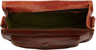 Brown leather bag with green interior on a white background