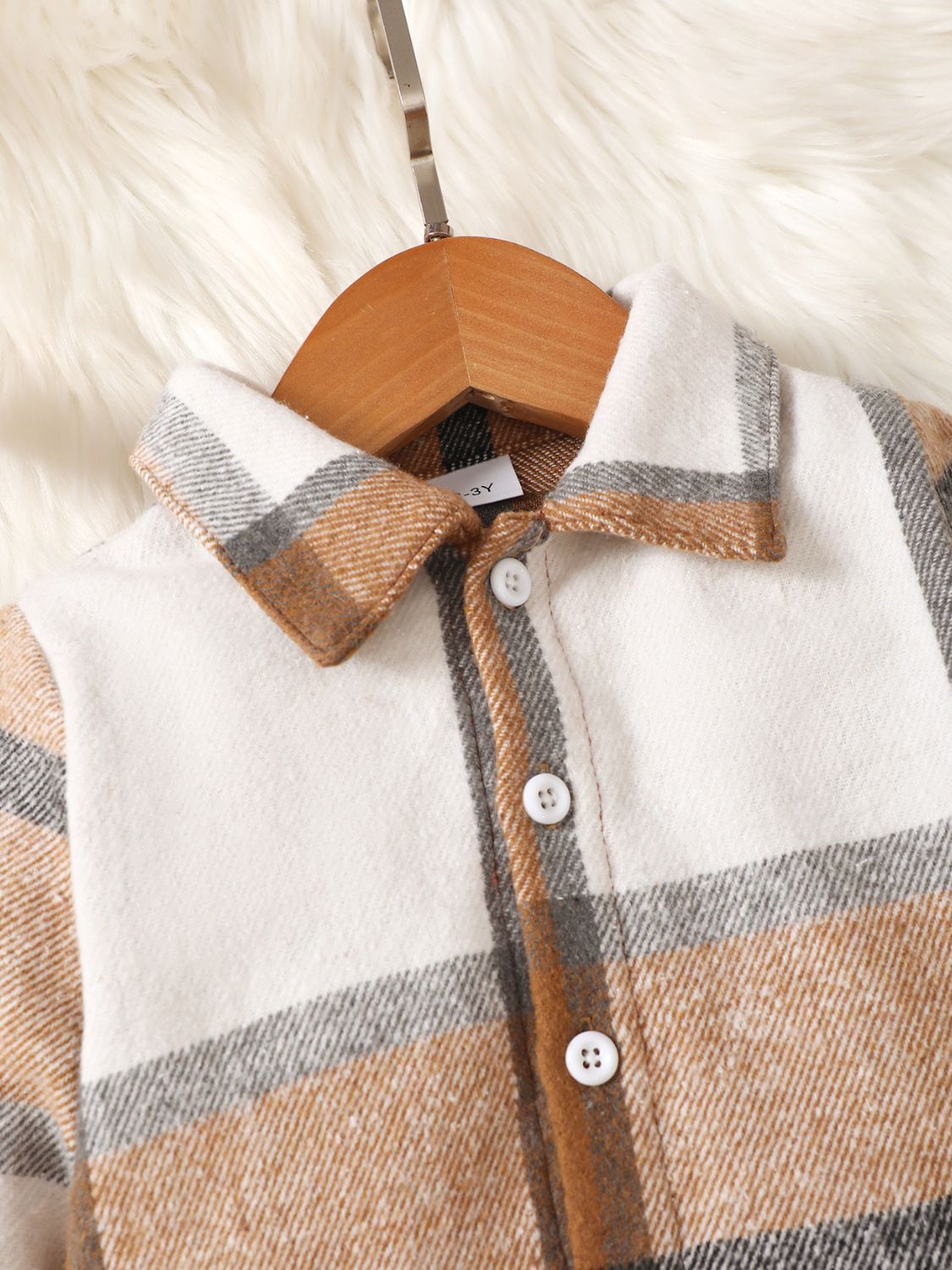 Elevate your little one's style with Momma's Boy color block top and pants set! Featuring a convenient button up closure and easy care machine washable fabric, this set is perfect for any occasion. Make a statement with the trendy color block design while staying practical for busy moms.