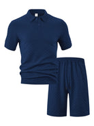 Luxury men's matching travel lounge set crafted in a deep navy blue textured dimensional knit.