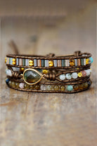 A detailed close-up view of the Stella bracelet, highlighting the unique raw textures and rich, polished colors of the hand-beaded natural agate stones.