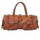 Brown leather duffel bag with brass hardware, multiple pockets, adjustable strap on a white background