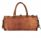 Brown leather duffel bag with metal buckles on a white background