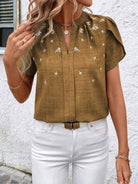 This Floral Notched Short Sleeve Blouse has a stylish notched neckline and a soft floral print. Made with breathable fabric, it stays comfortable all day and is great for both work and casual occasions.