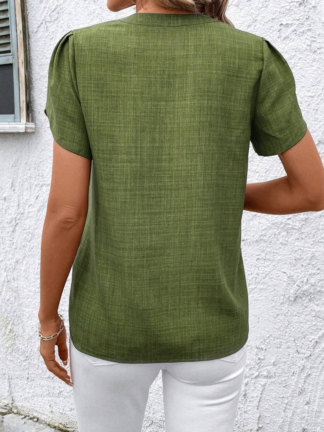 This Floral Notched Short Sleeve Blouse features a neat notched neckline and a delicate floral pattern. Made with breathable fabric, it provides comfort for all-day wear and suits both work and casual occasions.This Floral Notched Short Sleeve Blouse features a neat notched neckline and a delicate floral pattern. Made with breathable fabric, it provides comfort for all-day wear and suits both work and casual occasions.